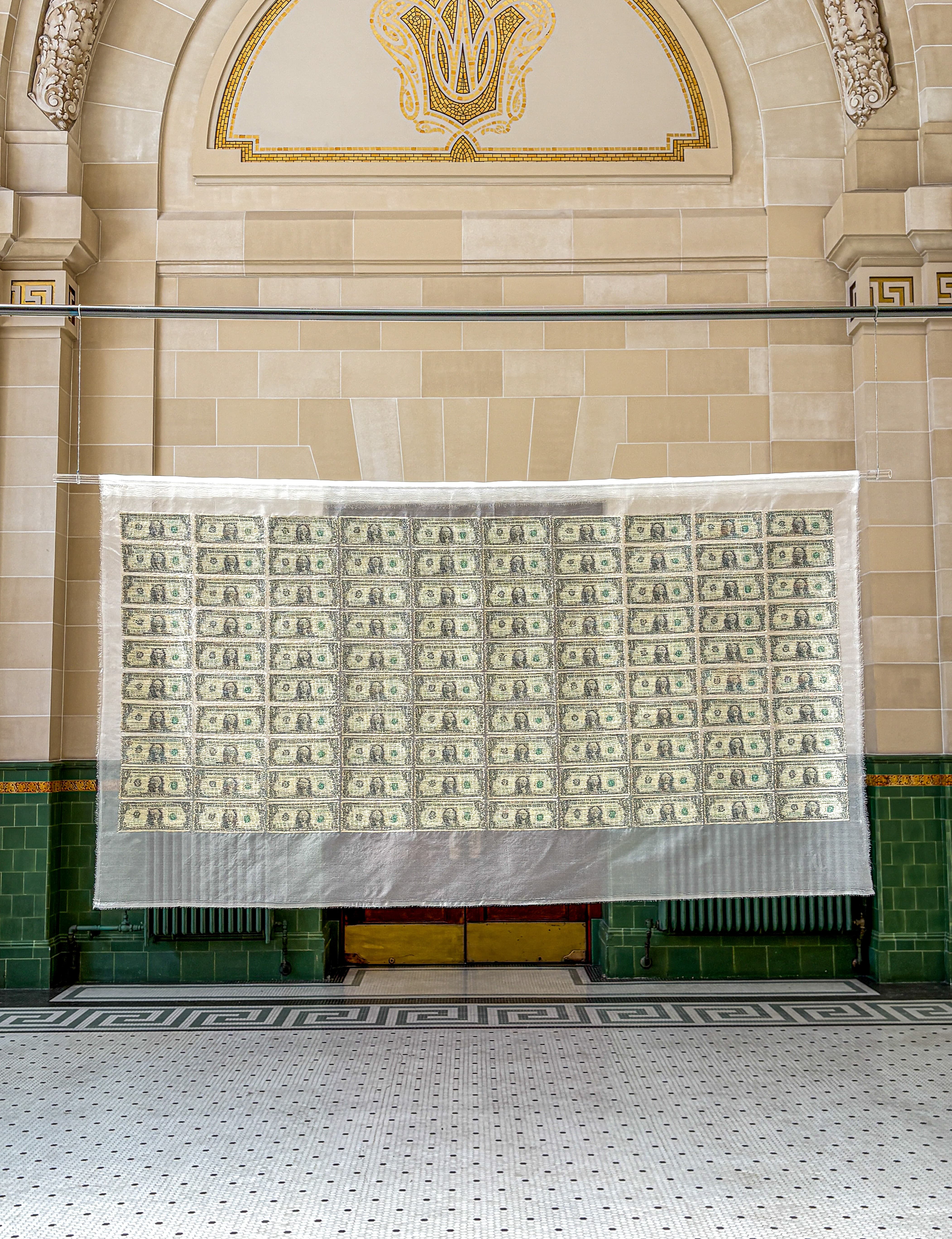 $100 installed in a large translucent silk mesh panel.