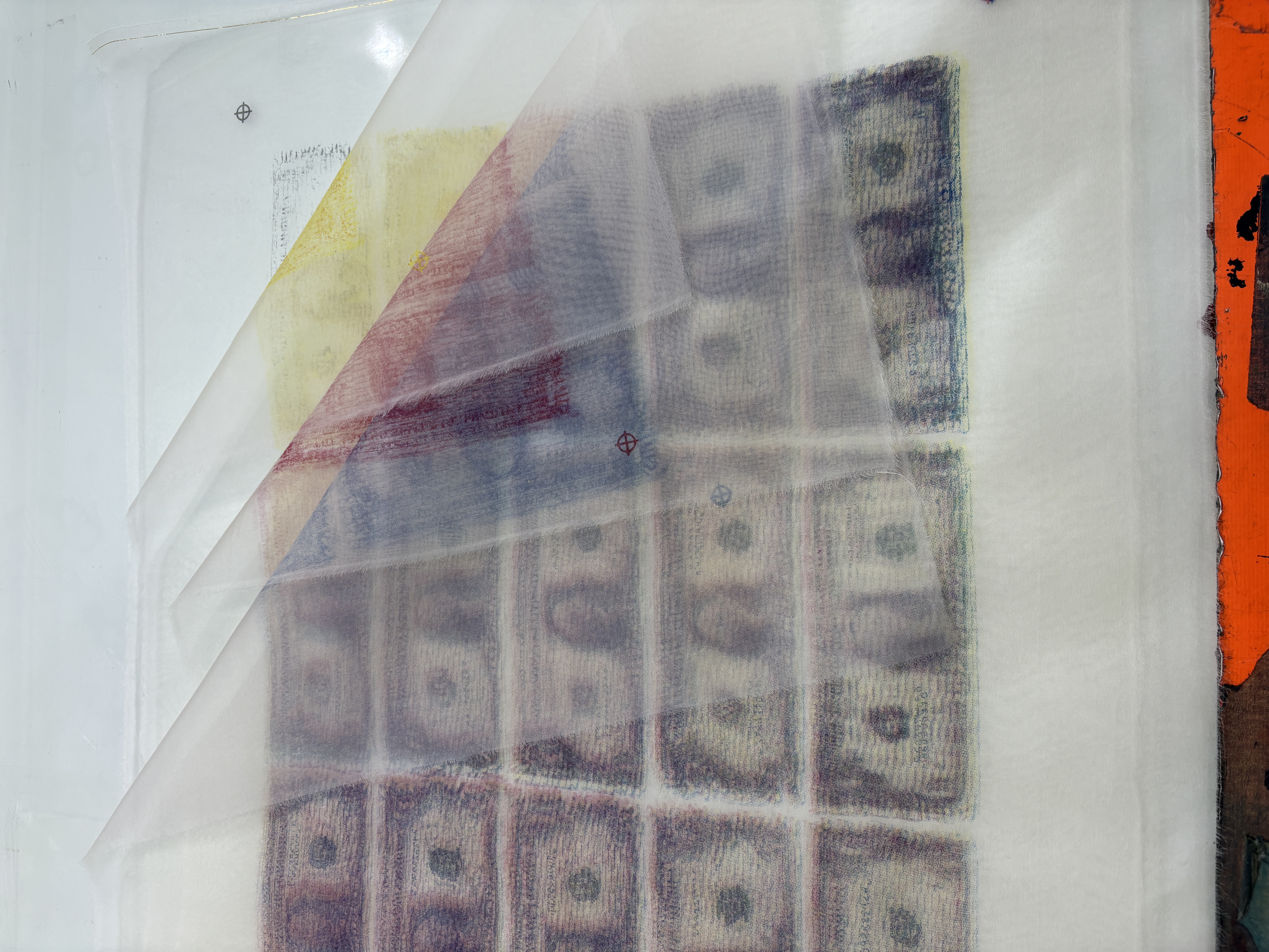 CMYK screen-print separations arranged during testing.