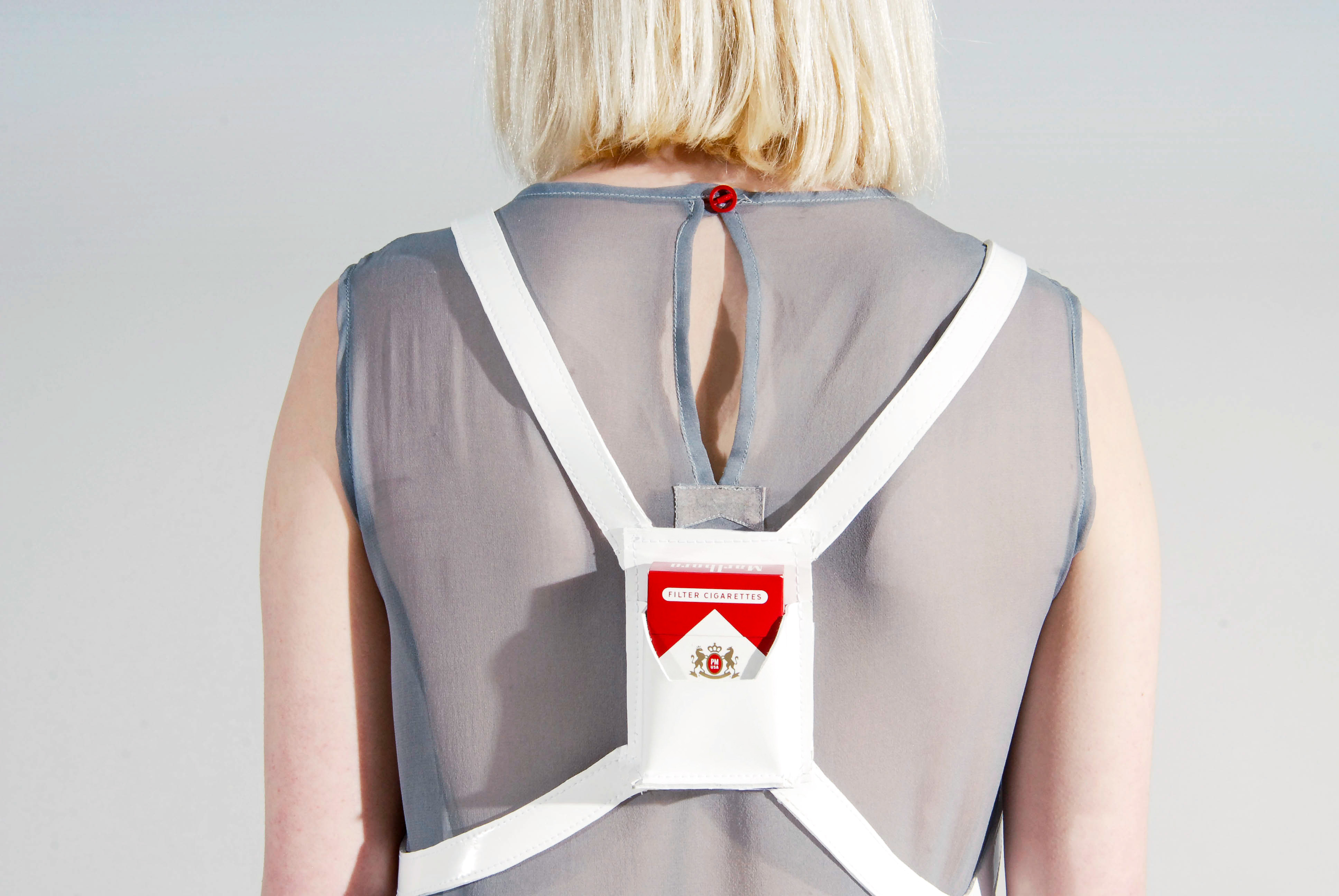 Back detail of Look 02 showing the harness construction.